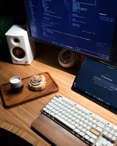 Cake & coding — Web by Varis Celebration cake on a coding desk at Web by Varis — tech tips and decent setups